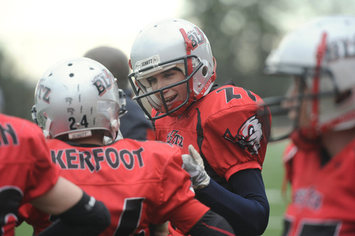 Sarah A. Miller  |  The Salt Lake Tribune

Utah Blitz players Chrystle Kerfoot, left, and Ashley Kuster, right, talk on the sideline during their game at the Judge Memorial High School football field Saturday afternoon May 14, 2011. The all-female team played the Las Vegas Show Girlz.