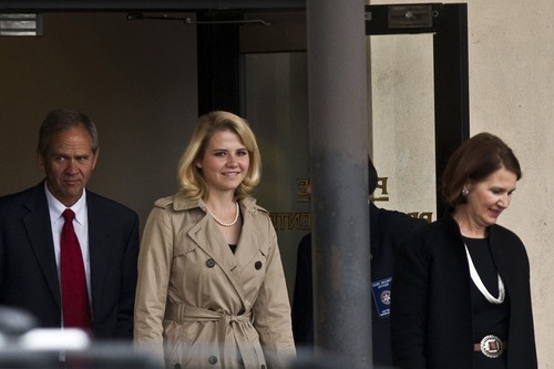 Chris Detrick  |  The Salt Lake Tribune 
Elizabeth Smart and her parents, Lois and Ed Smart, walk out of the Federal Courthouse in Salt Lake City during the Brian David Mitchell trial on November 10, 2010.