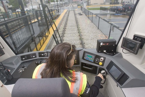 PAUL FRAUGHTON  |  The Salt Lake Tribune
TRAX train driver Joann Montoya sits at the controls of a new train. The Utah Transit Authority began testing the Mid-Jordan line on Tuesday -- testing that will continue for months until the scheduled opening Aug. 7.