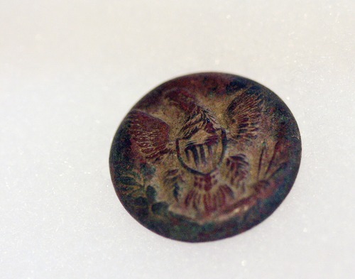 Sarah A. Miller  |  The Salt Lake Tribune

This 7th Cavalry military uniform button from the 1833-1885 period is the same style of button that Christopher Kortlander sold on eBay, which prompted a raid by federal agents in 2005. Agents asserted that he was illegally buying and selling American Indian artifacts.