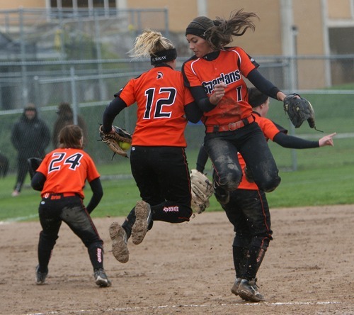 Steve Griffin  |  The Salt Lake Tribune file photo

Murray pitcher Braylee Butcher, left, and second baseman Lauren Bell celebrate during a game against West Jordan at the Salt Community College in Taylorsville in May.