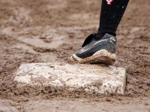 Steve Griffin  |  The Salt Lake Tribune

First base and most of the players were covered in mud during softball game between Murray and West Jordan at the Salt Community College in Taylorsville, Utah Wednesday, May 18, 2011.