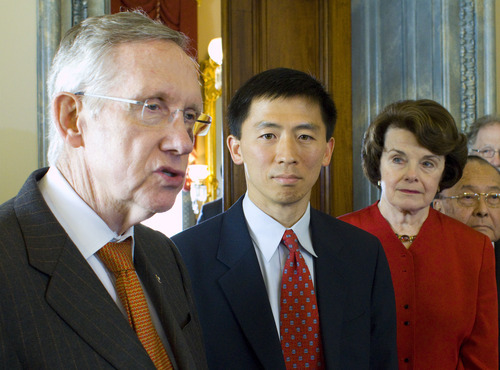Harry Hamburg  |  The Associated Press
Senate Majority Leader Harry Reid, D-Nev., with judicial nominee Goodwin Liu and Sens. Diane Feinstein, D-Calif., and Daniel Inouye, D-Hawaii, on Capitol Hill in Washington on Wednesday. The Senate voted 52-43 on Thursday to block Liu's nomination to the 9th Circuit Court of Appeals.