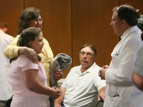 Steve Griffin  |  The Salt Lake Tribune
Richard, center, and Cecilia Tait and their daughter Vera Davis talk to Douglas Wirthlin, who was a member of a team of doctors from Intermountain Medical Center that performed a series of complex heart surgeries on Davis.