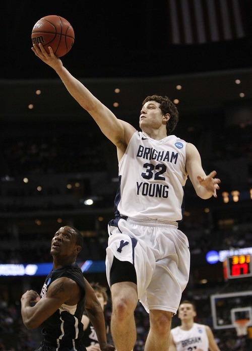 Tribune file photo
At BYU, Jimmer Fredette owned collegiate basketball. Now, Fredette is just another NBA Draft prospect.