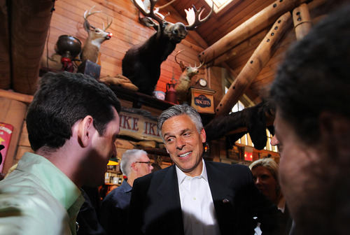 Cheryl Senter  |  The Associated Press
Former Utah Gov. Jon Huntsman Jr., center, talks to people at a meet and greet Thursday in Lebanon, N.H. Huntsman, who is exploring a presidential bid, has not decided to make his run official, but has made trips to Florida and South Carolina recently in addition to New Hampshire.