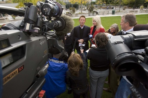 David James Bell, who was acquitted of child kidnapping charges, is flanked by his defense lawyers Roger Kraft and Susanne Gustin in this 2009 Tribune file photo.