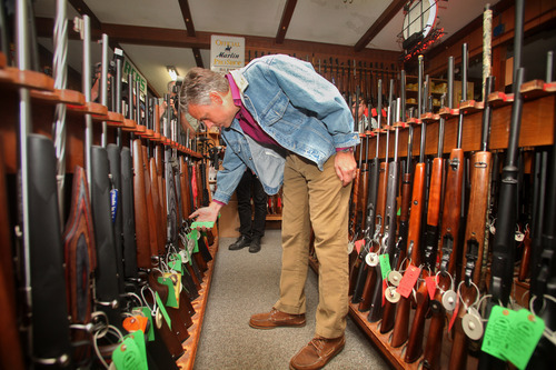 Max Bittle, special to The Salt Lake Tribune
Former Utah Gov. Jon Huntsman Jr. looks over the inventory at Riley's Gun Shop in Hooksett, N.H.