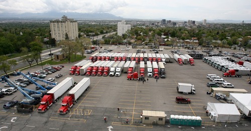 Steve Griffin  |  The Salt Lake Tribune

As the U2 360 Tour stage begins to take shape inside Rice Eccles Stadium buses and semis used to support the show fill up the west parking lot in Salt Lake City on Monday, May 23, 2011.