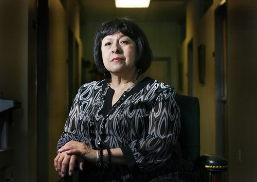 Scott Sommerdorf  |  The Salt Lake Tribune
Domestic violence survivor Brandy Farmer at her office in Salt Lake City. When Farmer told her first husband their marriage was over, he quietly walked out of the room and loaded his handgun. He pressed the barrel against their 9-month-old daughter's head. 