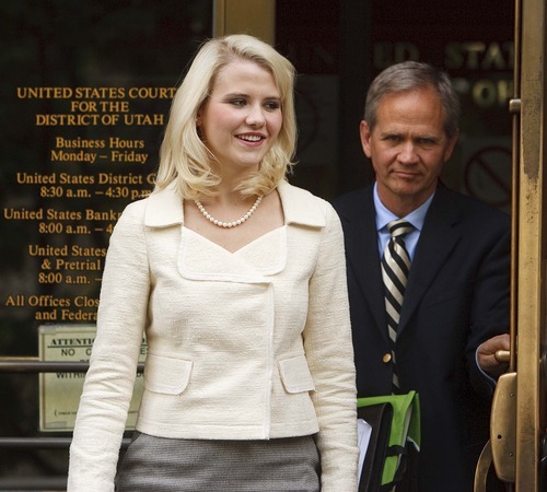 Trent Nelson  |  The Salt Lake Tribune
Ed and Elizabeth Smart exit the Frank E. Moss Courthouse in Salt Lake City on Wednesday, May 25, 2011, after Brian David Mitchell was sentenced to life in prison for his role in the kidnapping of Elizabeth Smart.