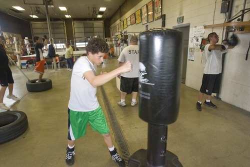 Paul Fraughton  |  The Salt Lake Tribune
Terrell Eskelson, age 13, hits a punching bag at the Fullmer Brothers Gym in West Jordan on Thursday  May 19, 2011