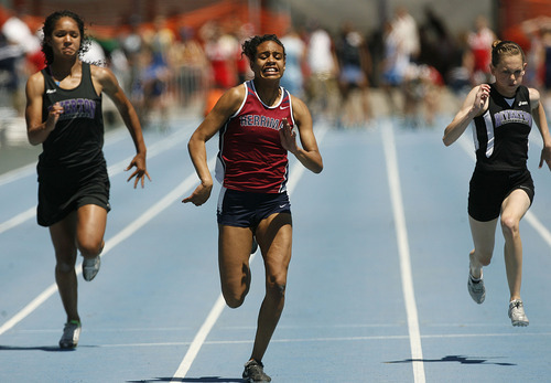 Scott Sommerdorf  |  The Salt Lake Tribune
Charis Wingster of Herriman wins the girls' 5A 100-meter dash ahead of two Riverton runners, Darian Jenkins, left, and Taylor Gomez, right, at the state high school track championships held at BYU on Saturday.