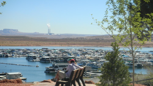 Tom Wharton  |  The Salt Lake Tribune
Tourists enjoy their time at Wahweap Marina with the Navajo
Power Plant in the background.