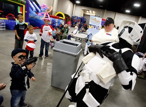 Trent Nelson  |  The Salt Lake Tribune
Dressed as a scout trooper, Ryan Simmons reacts to being 