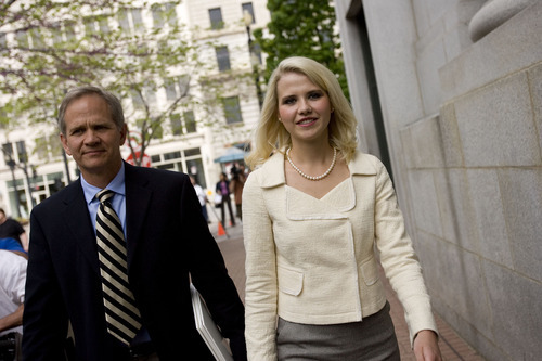 Djamila Grossman  |  The Salt Lake Tribune

Elizabeth Smart and Ed Smart leave court after Brian David Mitchell received a life sentence Wednesday, May 25, 2011.