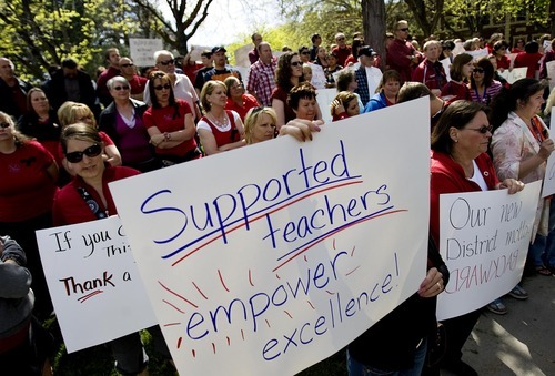 Djamila Grossman  |  The Salt Lake Tribune
Ogden teachers protest in front of the Ogden School District offices on Thursday. Ogden teachers have worked the whole school year without a contract.