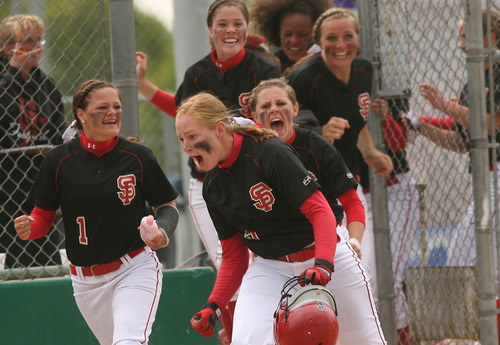 Leah Hogsten  |  The Salt Lake Tribune
Spanish Fork's bench erupts in the 6th inning after teammate Lyndsey Healey hit a home run. 
Spanish Fork  High School girls defeated Tooele High 6-5  to win the 4A Championship Softball Championship title , Friday, May 27 2011 in West Valley City.