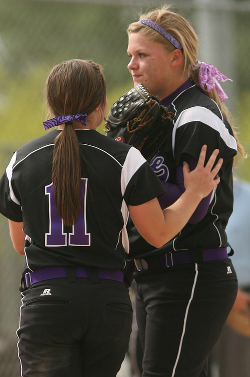 Leah Hogsten  |  The Salt Lake Tribune
Tooele's Kirsten Zander tries to reassure pitcher Lauren Frailey. 
Spanish Fork High defeated Tooele High 6-5 to win the 4A Championship Softball Championship title May 27.