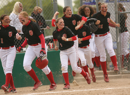 Leah Hogsten  |  The Salt Lake Tribune
Spanish Fork's bench erupts in the 6th inning after teammate Lyndsey Healey hit a home run. 
Spanish Fork  High School girls defeated Tooele High 6-5  to win the 4A Championship Softball Championship title , Friday, May 27 2011 in West Valley City.