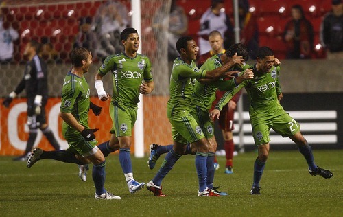 Djamila Grossman  |  The Salt Lake Tribune

Real Salt Lake plays the Seattle Sounders at Rio Tinto Stadium in Sandy, Utah, on Saturday, May 28, 2011. The Sounders team members cheer after they scored a goal in the second half.