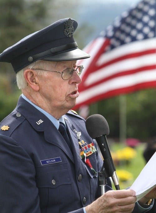 Rick Egan   |  The Salt Lake Tribune
Jay W. Neilson reads the names of veterans buried at the Bluffdale cemetery  during Memorial Day services Monday.