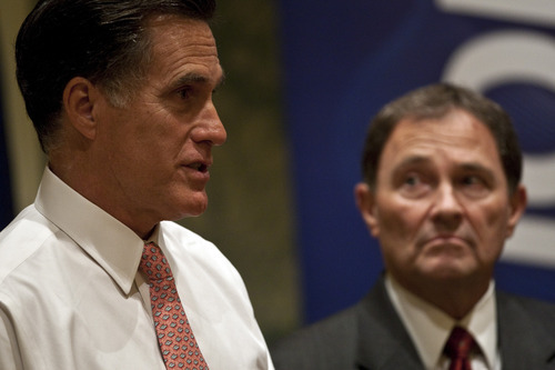 Chris Detrick  |  The Salt Lake Tribune 
Utah Governor Gary R. Herbert and Mitt Romney speak at the Grand America Hotel Tuesday October 5, 2010.