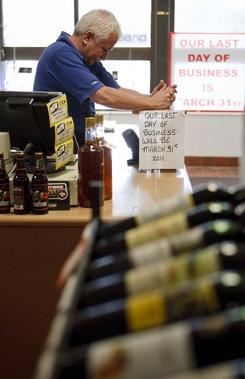 Trent Nelson  |  The Salt Lake Tribune
Tony Placencio, an employee at the state liquor store on Main Street in Salt Lake City, near the end of his final shift as the store closed for business in March.