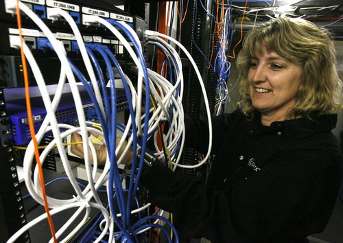Rick Egan   |  Tribune file photo

Sue Steel, Comcast technical manager over business services, checks the layer-two switch Wednesday at Stein Ericksen Lodge. Cable companies such as Comcast have grapple with the question: Are people really canceling cable to watch TV and movies from the Internet instead?