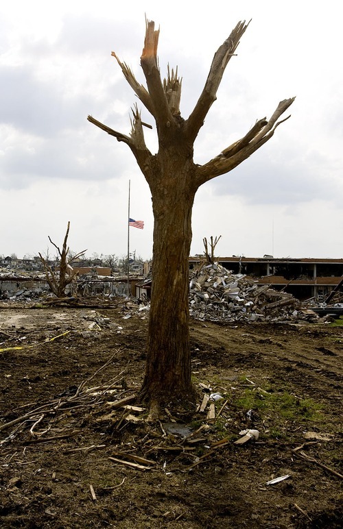 Djamila Grossman  |  The Salt Lake Tribune

A tree with broken branches stands near the rubble of a stake center of The Church of Jesus Christ of Latter-Day Saints in Joplin, Missouri, on Wednesday, June 1, 2011.