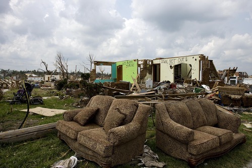 Djamila Grossman  |  The Salt Lake Tribune

Two couches stand in front of the destroyed home of Tim Bartow and his family in Joplin, Missouri, on Wednesday, June 1, 2011.