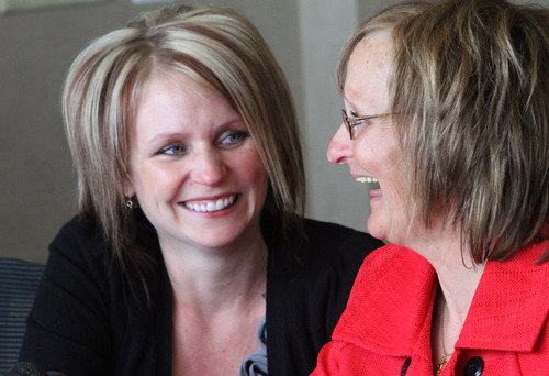 Rick Egan | The Salt Lake Tribune

Alana Williams, left, listens as her mother, Debra Brown, recently exonerated in a 1993 murder in Logan, speaks to reporters  Wednesday. The Utah Attorney General recently announced that the office will appeal the decision of the 2nd District Court judge who exonerated Brown.