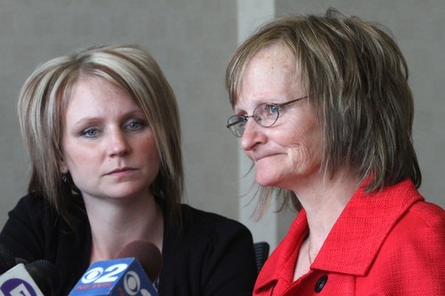 Rick Egan   |  The Salt Lake Tribune

Alana Williams, left, listens as her mother, Debra Brown, recently exonerated in a 1993 murder in Logan, speaks to reporters  Wednesday. The Utah Attorney General recently announced that the office will appeal the decision of the 2nd District Court judge who exonerated Brown.