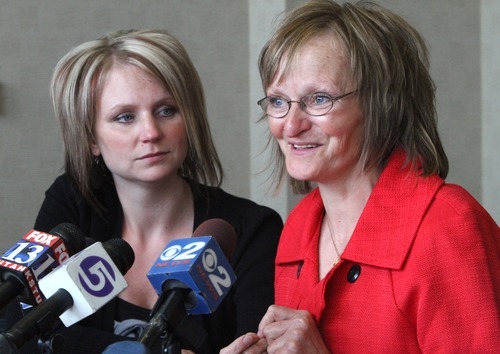 Rick Egan   |  The Salt Lake Tribune

Alana Williams, left, listens as her mother, Debra Brown, recently exonerated in a 1993 murder in Logan, speaks to reporters  Wednesday. The Utah Attorney General recently announced that the office will appeal the decision of the 2nd District Court judge who exonerated Brown.