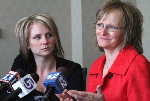 Rick Egan   |  The Salt Lake Tribune

Alana Williams, left, listens as her mother, Debra Brown, recently exonerated in a 1993 murder in Logan, speaks to reporters  Wednesday. The Utah Attorney General recently announced that the office will appeal the decision of the 2nd District Court judge who exonerated Brown.