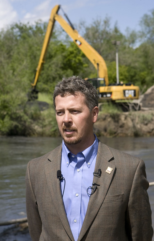 Al Hartmann  |  The Salt Lake Tribune
Patrick Leary, director of Salt Lake Public Works, talks at a press conference on the shore of the Jordan RIver near 1300 South and 900 West on Thursday to explain the county's preparations for the late spring runoff.