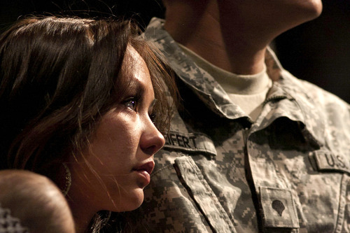 Cobb Condie  |  Special to The Salt Lake Tribune

Shantelle Vu rests her head on the shoulder of her fiance, Specialist Josh Seifert at Burns Arena of Dixie State College on Thursday, June 2, 2011. Seifert, along with other members of the National Guard in Southern Utah, will be leaving to go overseas on Saturday.