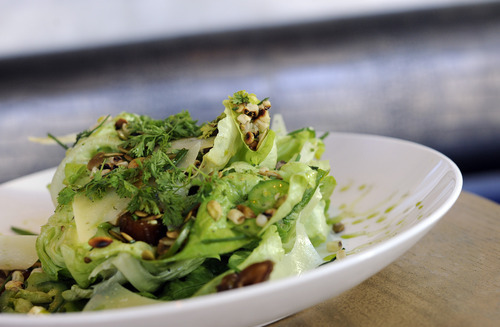 Sarah A. Miller  |  The Salt Lake Tribune

Butter leaf salad with roasted corn, roasted pumpkin seeds, jalapeno slices, dates parmesan and basil vinaigrette at Silver on Main Street in Park City.