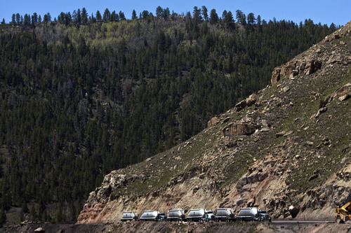 Photo by Chris Detrick | The Salt Lake Tribune 
Trucks line up to receive coal at Sufco Mine in Emery Friday June 3, 2011.  Coal has been mined continuously from the SUFCO mine since 1941.