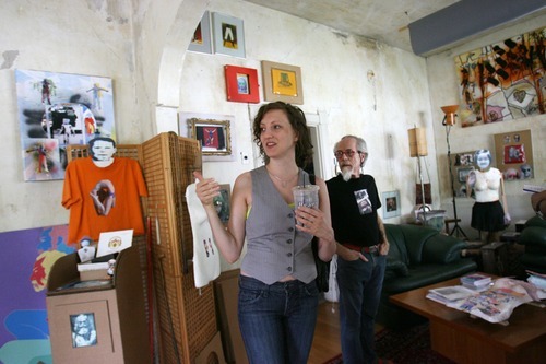 Steve Griffin  |  The Salt Lake Tribune

Artist Jim Williams, right,  in his Salt Lake City home Wednesday, June 1, 2011. Williams has been installing his art work in his home for years.  Cara Despain, left, is curating an exhibition about the house.