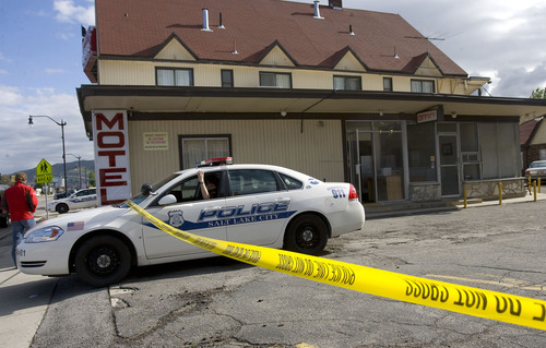 Al Hartmann  |  The Salt Lake Tribune
Salt Lake City Police block the driveway to the Capitol Motel at 1749 S. State St. on Thursday after Jessica Jensen's body was found stuffed inside a bed in one of the rooms about 2:15 a.m.