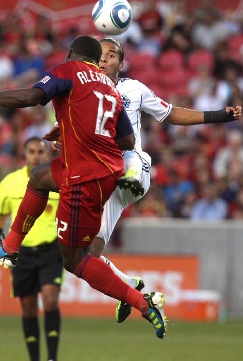 Rick Egan   |  The Salt Lake Tribune

Jean Alexandre goes for the ball along with Vancouver's Alexandre Morfaw (27) in MLS action Real Salt Lake, vs Vancouver, at Rio TInto Stadium, Saturday, June 4, 2011