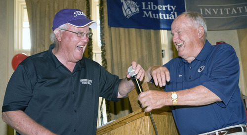 Al Hartmann  |  The Salt Lake Tribune
Former Utah football coach and now Weber State University Coach Ron McBride, left, trades barbs with his old friend, former BYU Coach LaVell Edwards at the Liberty Mutual Invitational BYU-Utah golf outing at the Salt Lake Country Club on Monday, June 6.