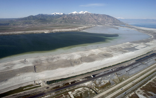 Francisco Kjolseth  |  The Salt Lake Tribune
Alaskans worried about the massive Pebble copper mine proposed for their state near Bristol Bay by Rio Tinto got a bird's-eye view of the Kennecott mine on Monday, in an effort to give Alaskans an idea of what they face. Local air quality activists were on hand to discuss the expansion plans on the Kennecott mine after taking off from South Valley Regional Airport.