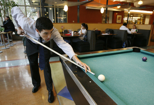 Francisco Kjolseth  |  The Salt Lake Tribune
Kyle Coffman, a senior at Westminster College takes a break from studying for finals weeks by playing a little pool at the Shaw Center recently. Westminster's enrollment picture has changed dramatically, with far more students coming from out of state looking for a traditional liberal arts small-campus experience that happens to be in a large Western city close to great skiing and other outdoor opportunities.