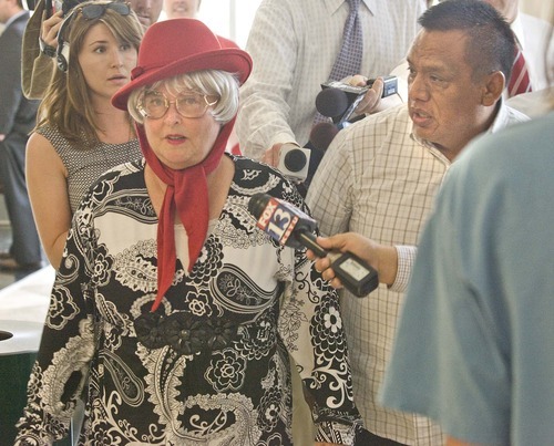 Paul Fraughton  |  The Salt Lake Tribune  After her appearance in court  and her sentence of 250 hour of community service, Teresa Bassett is berated by Hispanic Community activist Tony Yapias  Monday,  June 6, 2011.