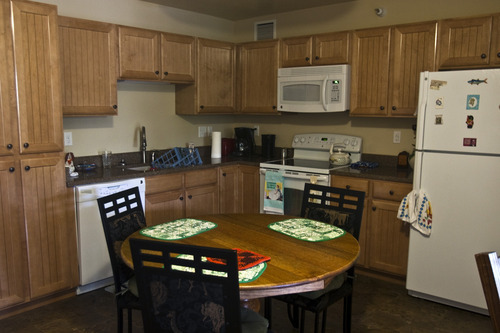 Chris Detrick | The Salt Lake Tribune 
An apartment at the Plymouth View Senior Housing features maple cabinets and stone countertops.