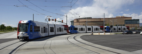Francisco Kjolseth  |  The Salt Lake Tribune
Train operators testing the new West Valley City TRAX line head toward the Decker Lake station near the Maverik Center. The new line is scheduled to open on Aug. 7.