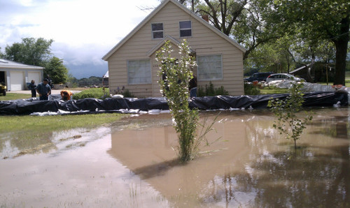 Cimaron Neugebauer  |  The Salt Lake Tribune
This West Warren home is in danger of flooding after a levee break along the Weber River on Wednesday.