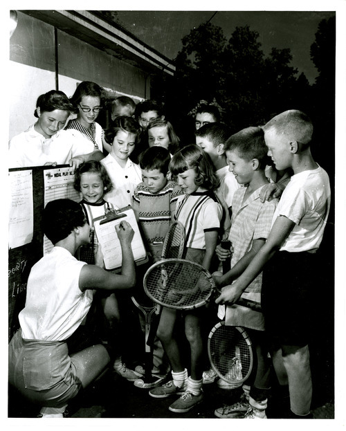 This undated photo shows children at the tennis courts. We think this may be from the No Champs Tennis Tournament sponsored by the The Tribune for a number of years, but there isn't any information with the photo. Tribune file photo
